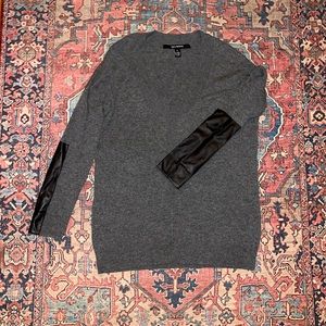 Cashmere sweater with leather sleeves